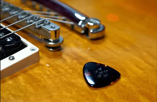 Picking Perfection: A Comprehensive Guide to Guitar Picks and Techniques